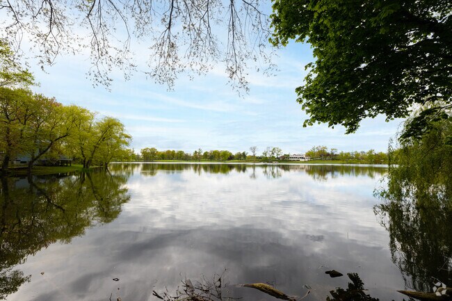The lake at the heart of Lake Success offers scenic views and peaceful surroundings.