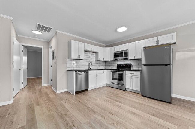 Newly Renovated Flats & Townhomes in the Heart of Angier! Pets Welcome!, Angier, NC 27501 - photo 4