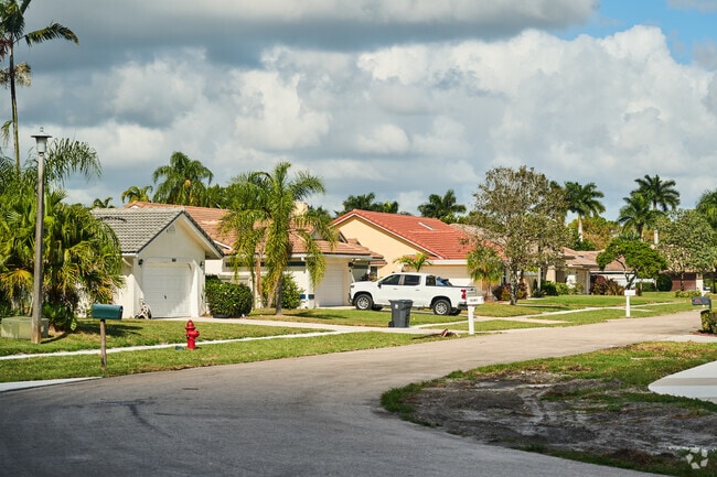 Attached garages help keep your car out of the heat in Greenview Shores of Wellington.