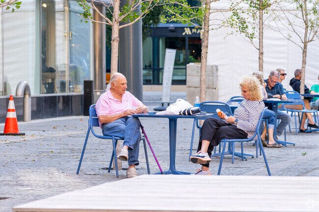 There are a lot of outdoor seating in Peace Plaza to admire the Historic buildings.