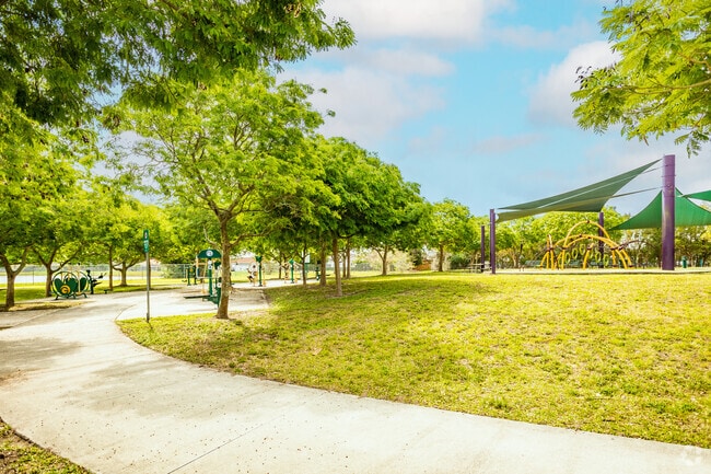Morning stretches are common at Eden Lake Park in West Kendall.