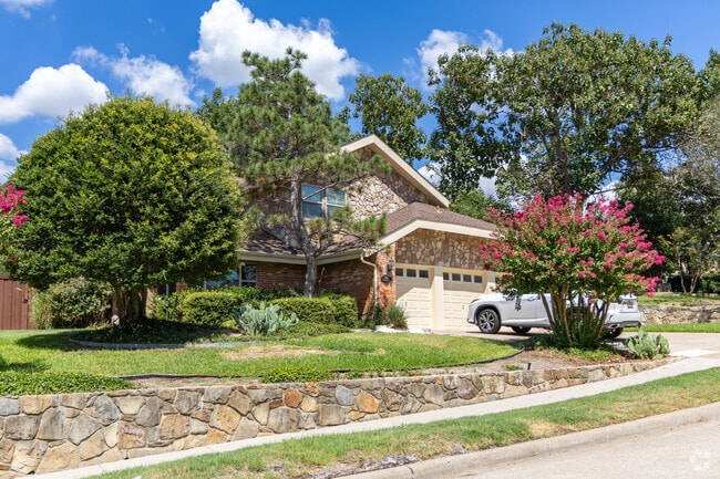 Old Shepard Place features lush, well-kept front lawns that reflect the neighborhood’s beauty.