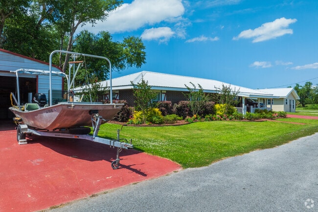 Larger lots in Galliano provide home owners with an opporunity to get creative and outfit two driveways.