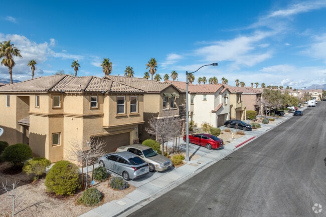 Centennial Hills Town Center mostly consists of one- and two-story homes with Spanish revival elements like smooth stucco exteriors and red-tile roofs.