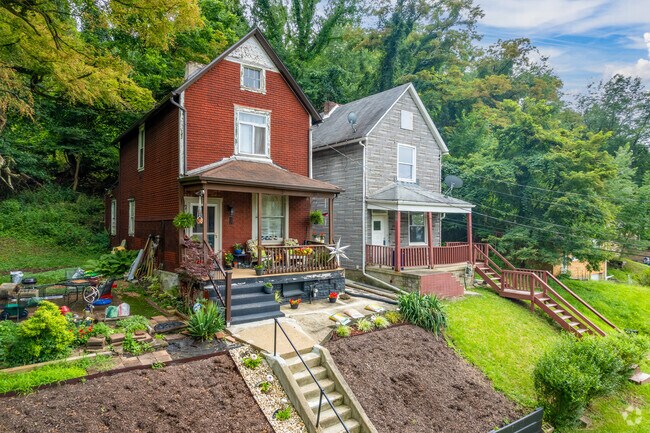 Many of the homes in East Hills feature front porches with beautiful views from the hillside.