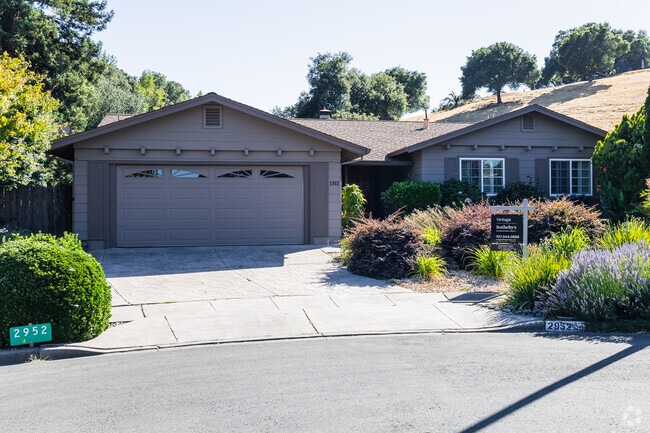 This Browns Valley residence combines modern design with lush landscaping.
