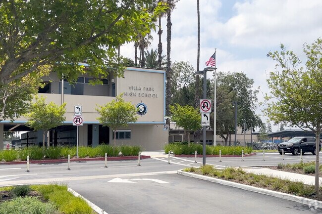 The flag flows in the breeze at the Villa Park High School's main entrance.
