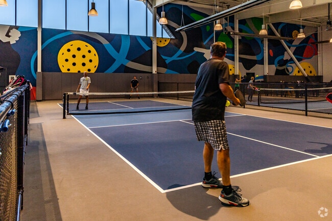 Guests enjoy Pickleball, cornhole and tasty bites at SERV.