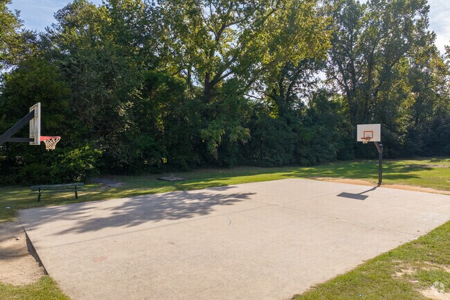 Play a pickup game of basketball on one of Richmond Hill's public courts.