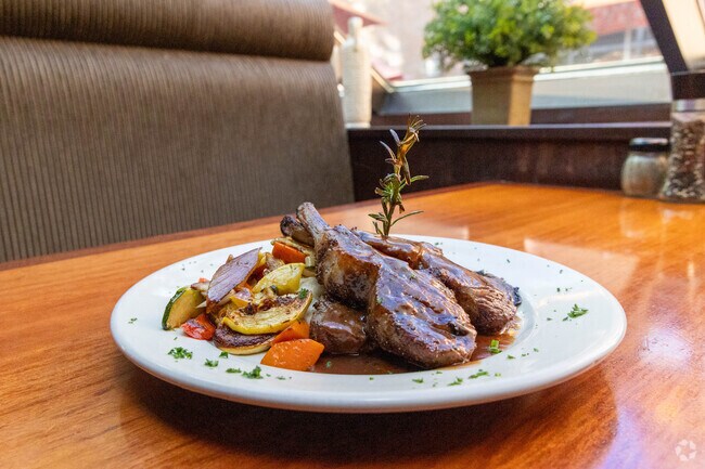 Spezia serves Italian cuisine, wood-grilled entrees and Angus steaks.