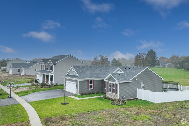 Near Dungan park, a row of homes sit quietly after the rain in Hebron-Aldon.