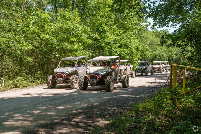 A group of ATV enthusiasts takes to the trails in Long Pond near Kidder.