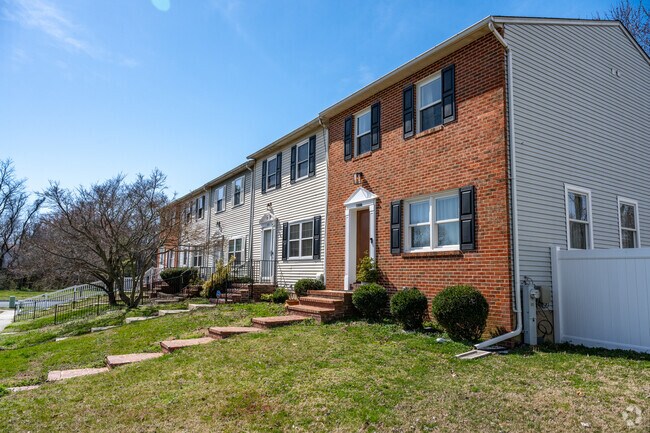 Live in. a beautiful brick townhome in Riviera Beach.