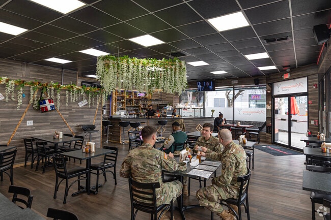 Stop by for delicious Dominican lunch at Mamajuana Restaurant, near Cleghorn.