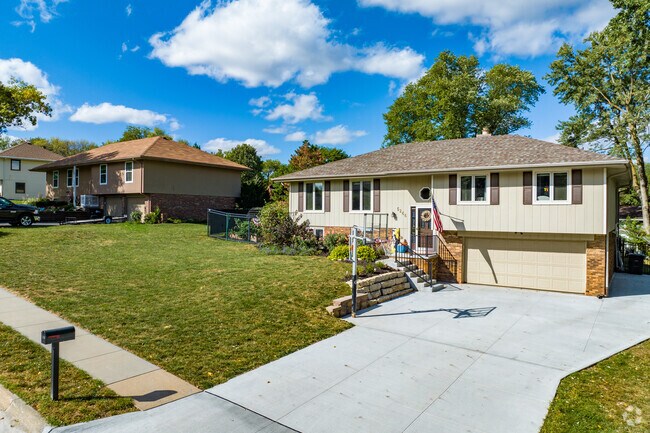 Portions of Raven Oaks emerge from the woods, giving homes broad, rolling lawns.