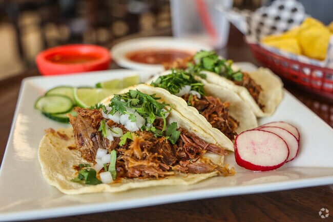 Stop by El Hidalguense Restaurant for delicious lamb tacos in Rosewood.