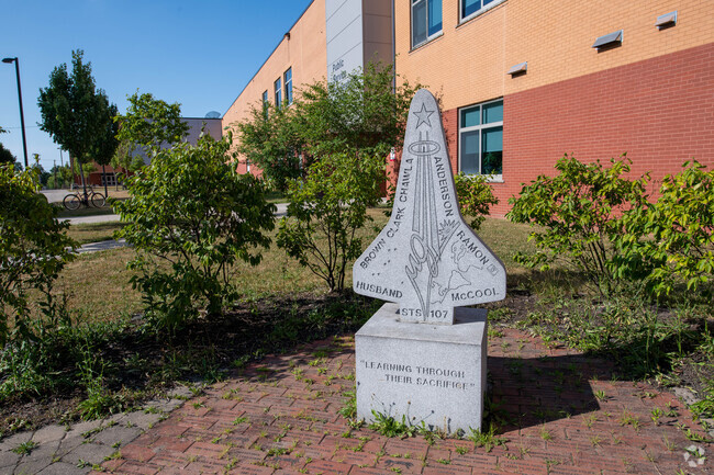 The George W. Fowler High dedication statue supports excellence in education in Westside.