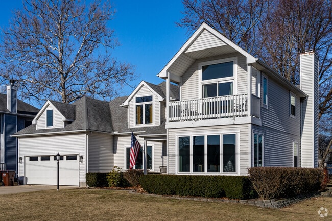 Large homes overlooking Lake Erie in Bolles Harbor are ideal for growing families.