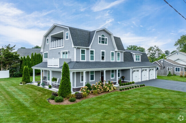 This beautiful home in Old Saybrook comes with a three car garage