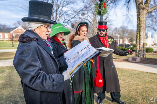 Carolers merrily sing holiday tunes at the annual Hinsdale for the Holidays event.