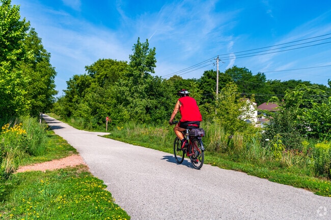 The Hank Aaron State Trail is a very active path on the south edge of Johnson's Woods.