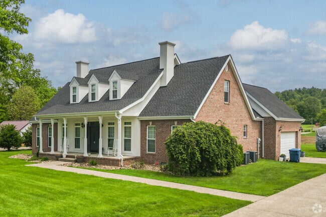 There are many homes in the neighborhood of Lesage that have well maintained larger yards.