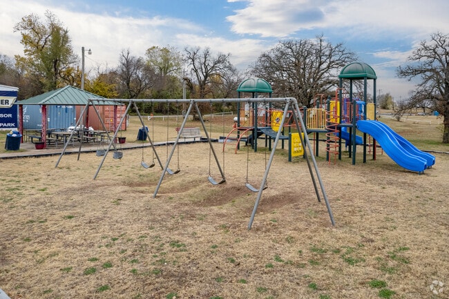Kids can swing and run around the Dibble City Park.