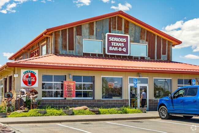 The Serious Texas BBQ restaurant is a spacious eatery just south of Registry Ridge, off Route 287.