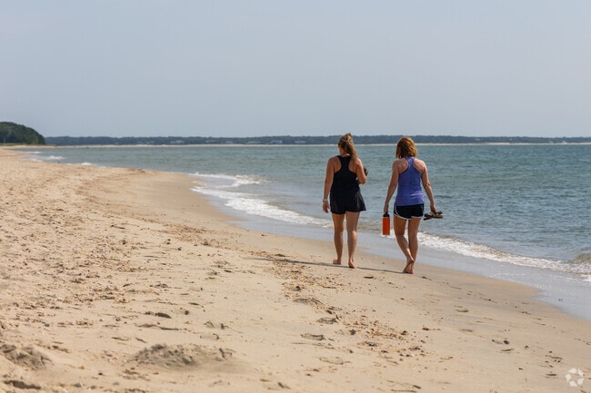 Popponesset residents love quiet walks on the beach with friends.