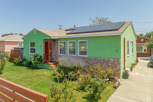 A colorful, typical 40's stucco ranch home in Mount Hope exemplifies older housing stock.