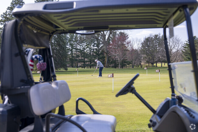 Maplecrest residents head to the Maplecrest Country Club for their weekly round of golf.