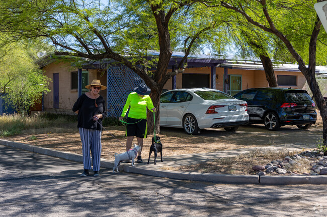 Residents of Mitman love taking their dogs on walks through the shaded streets.