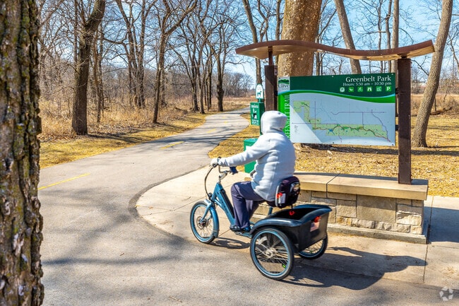 Walkers, joggers, and bikers can all use the Clive Greenbelt Trail at the same time.