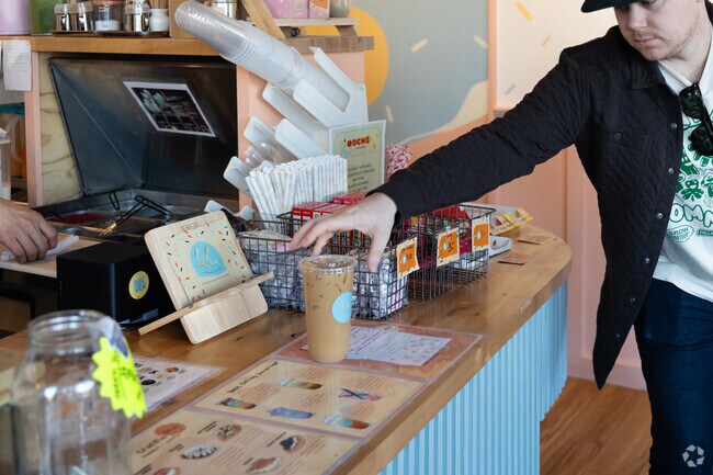 Grab your daily coffee at Lecha in the Deering Center neighborhood.