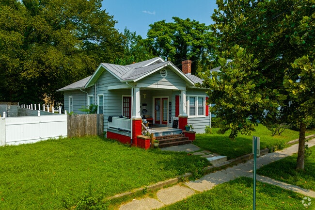 Brightly painted homes elevate the curb appeal and overall gesture of Brauers.