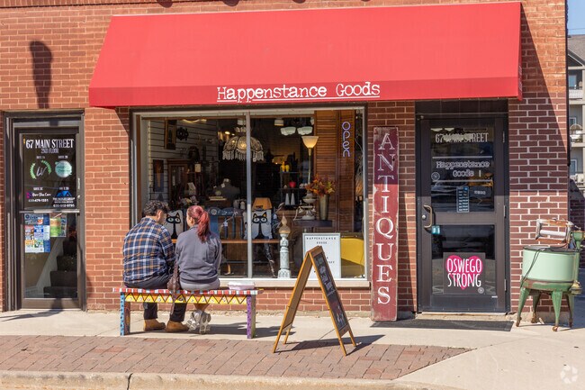 Downtown Oswego is a nice place to relax with a friend while shopping on the main street.