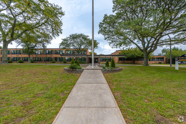 The walkway to the main entrance of Charles Campagne Elementary School.