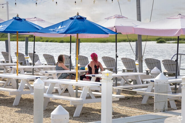 Locals enjoy waterfront dining and socializing at Dockers Waterside in East Quogue.