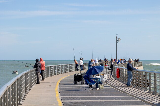 Local anglers enjoy fishing from the pier at Sebastian Inlet State Park.
