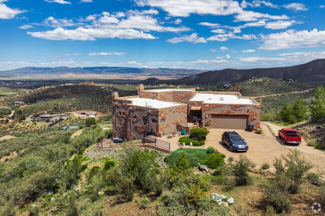 Custom Pueblo homes with hilltop views can be found in Lynx Mountain View Estates.