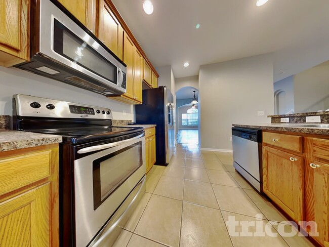 17437 Lawn Orchid Loop, Land O Lakes, FL 34638 - photo 7