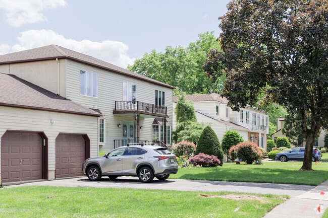Mid-century Colonial style houses share a street in Paramus, NJ.