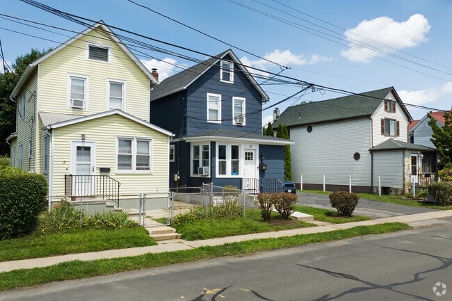 Cozy homes line Harrison’s peaceful streets, offering charm and comfort.