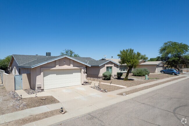 Most Midvale Park homes are made of stucco, featuring two car garages.