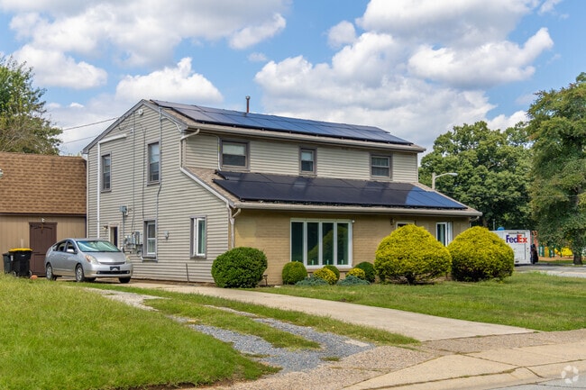 Many energy conscious residents in Minquadale fit their homes with solar panels.