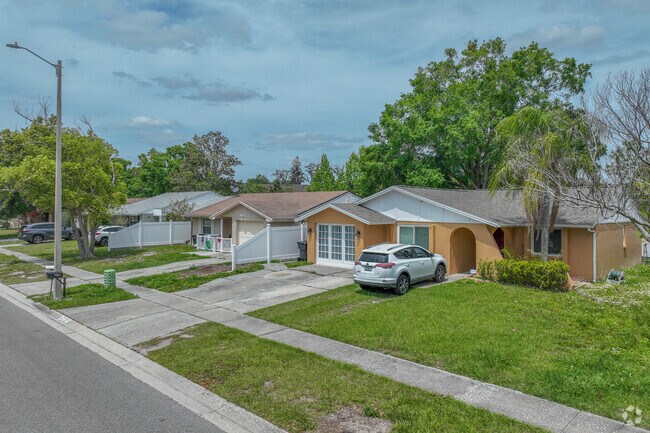 One-story single family ranch style homes lay close to each other in Citrus Park.