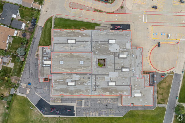 A bird’s eye view of Ridgecrest Elementary School shows a large colorful play area.