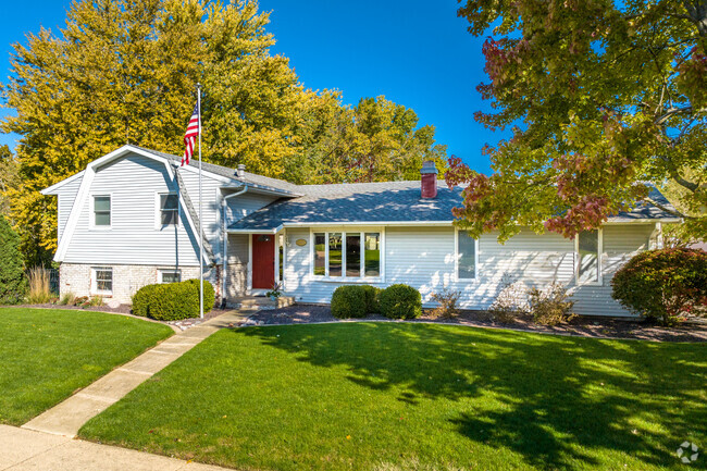 Two-story mid-century home in the South of Broadway neighborhood of Peoria, IL.