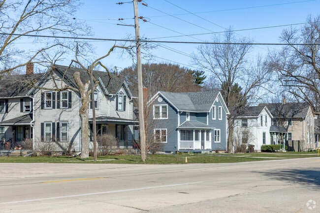Two story farmhouse style homes with large front porches can be found near downtown Marengo.