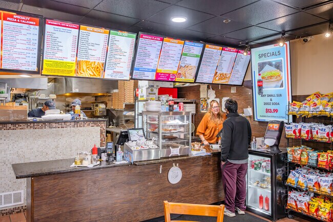 Gourmet Eros Pizza and Deli offers a variety of pizzas, subs, and salads.